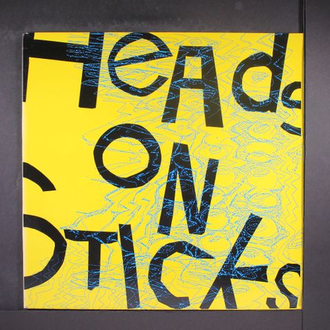 HEADS ON STICKS