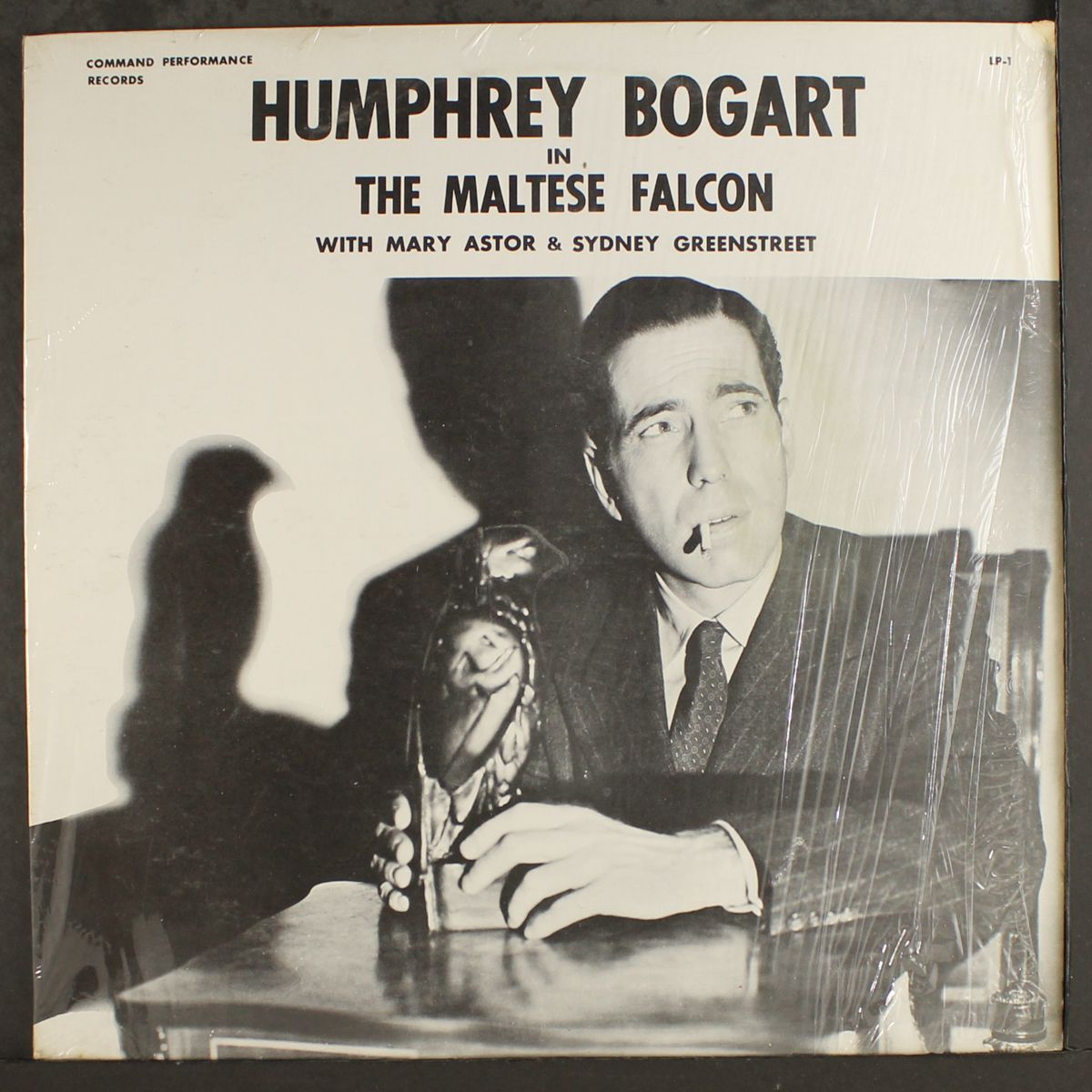 the maltese falcon / love's lovely counterfeit by HUMPHREY BOGART