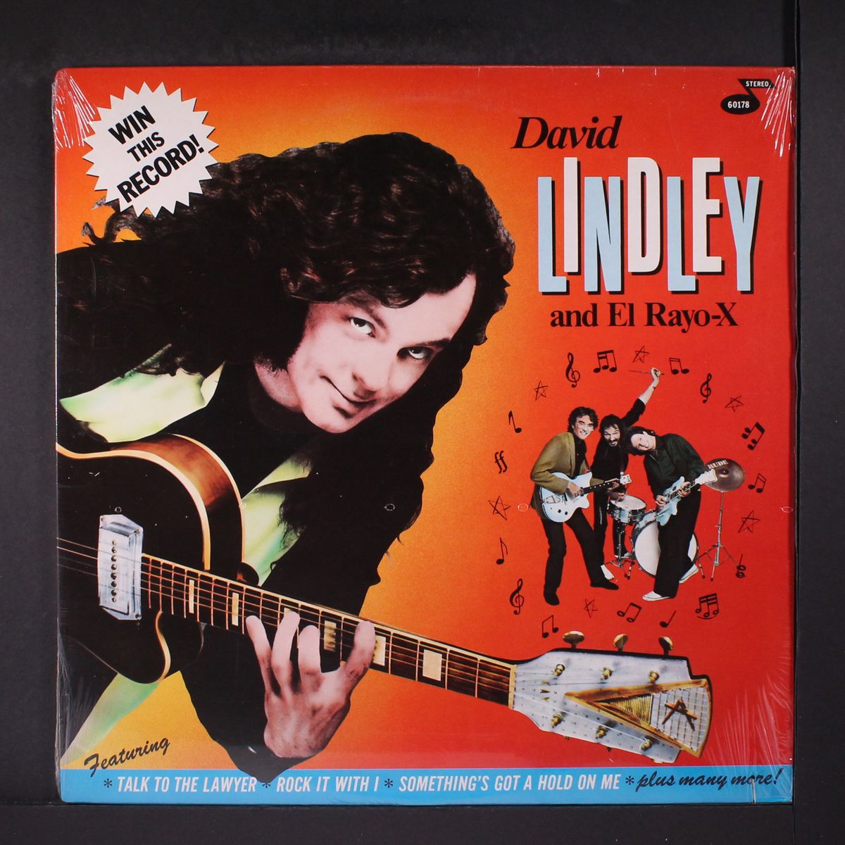 win this record by DAVID LINDLEY & EL RAYO-X