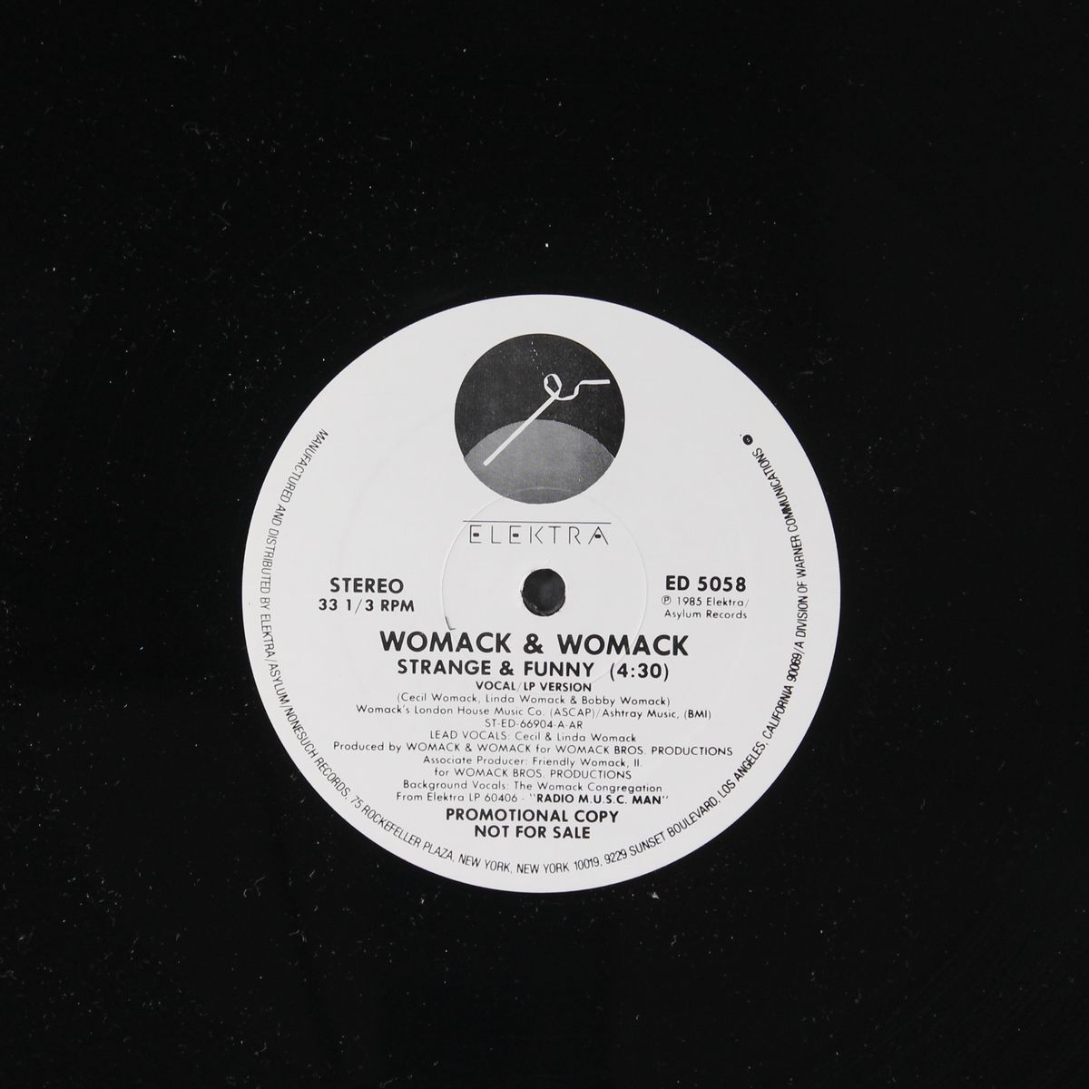 strange & funny / same by WOMACK & WOMACK