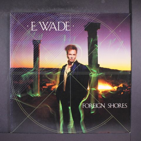 E. WADE