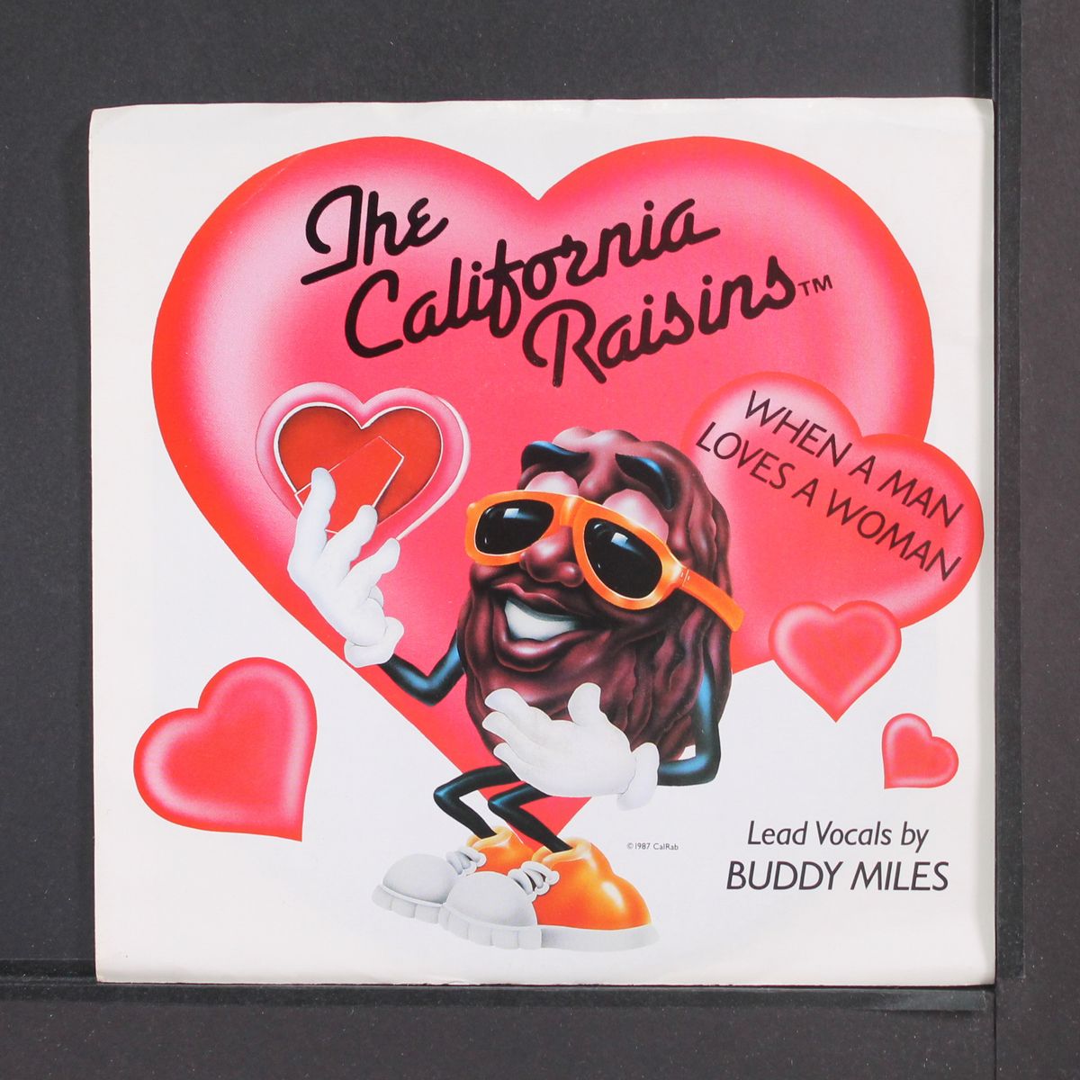 when a man loves a woman / sweet delicious & marvelous by BUDDY MILES & CALIFORNIA RAISINS