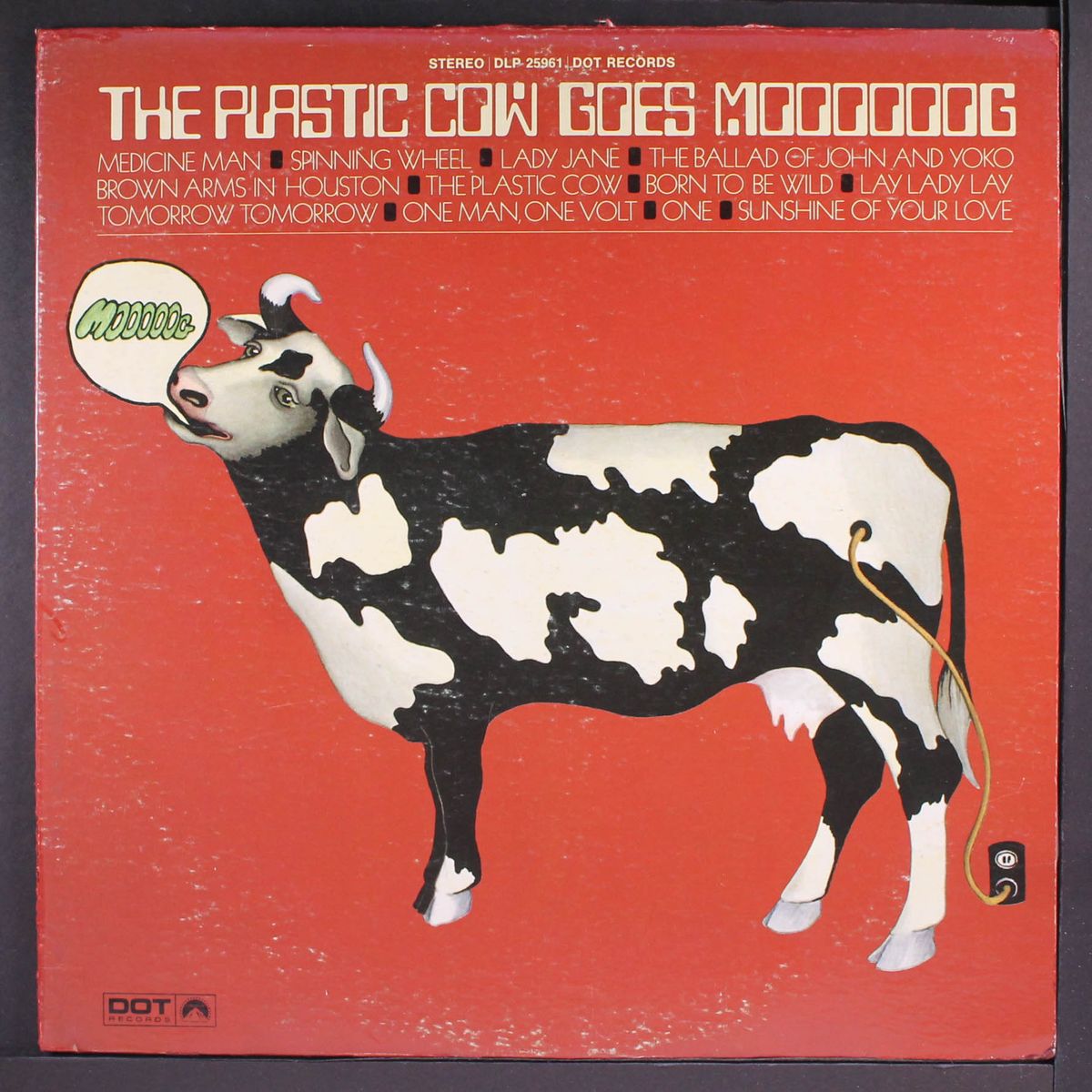 the plastic cow goes moooooog by MIKE MELVOIN