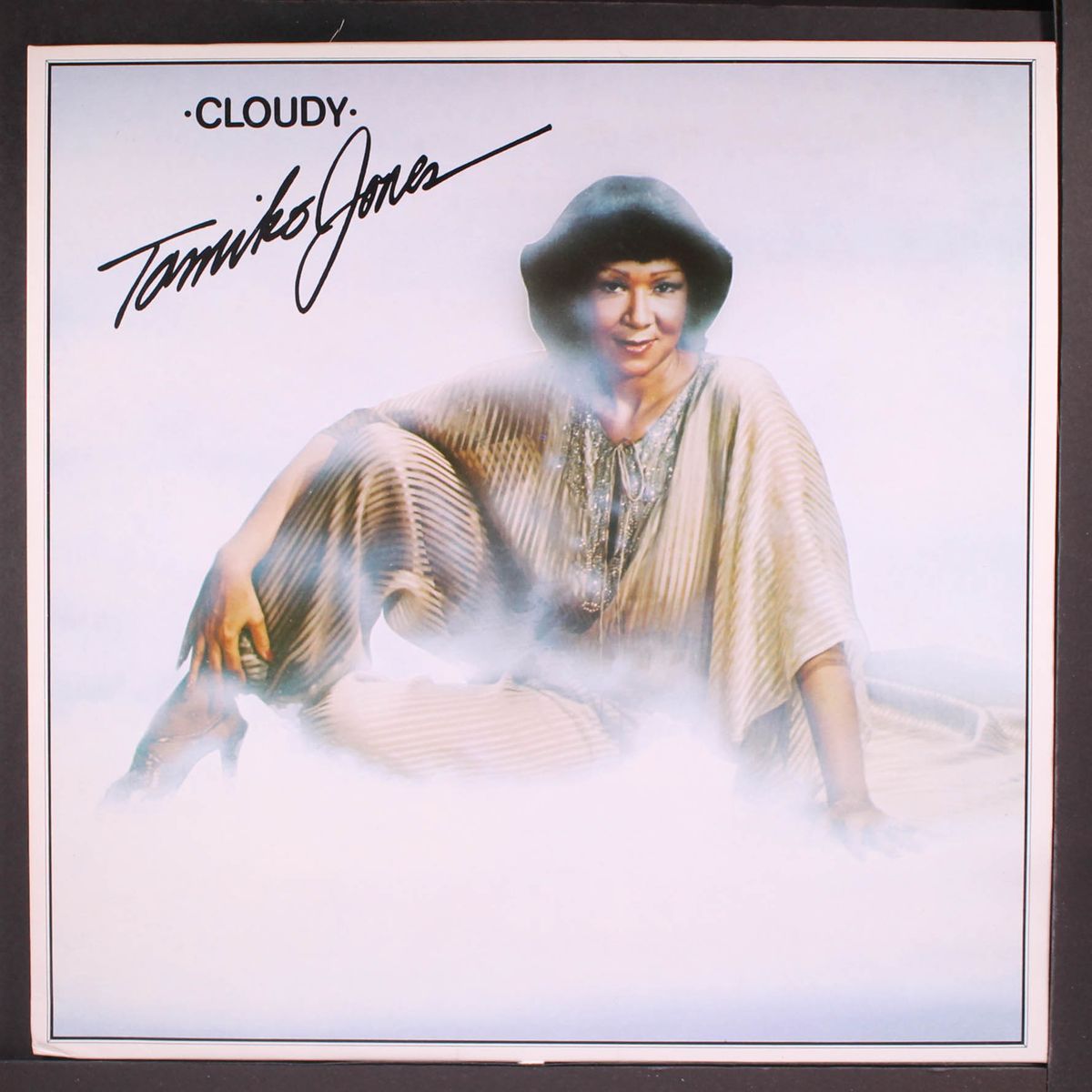 cloudy by TAMIKO JONES