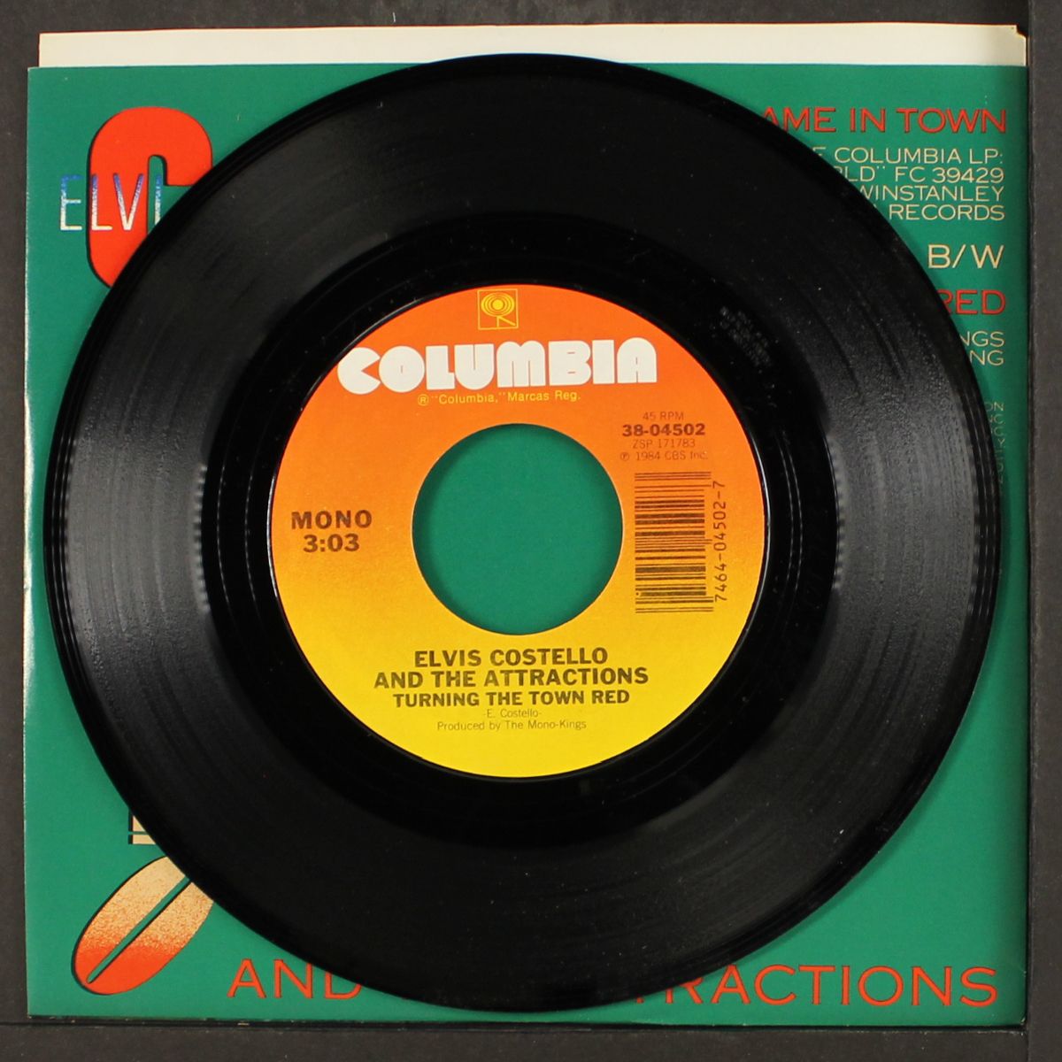 the only flame in town / turning the town red by ELVIS COSTELLO