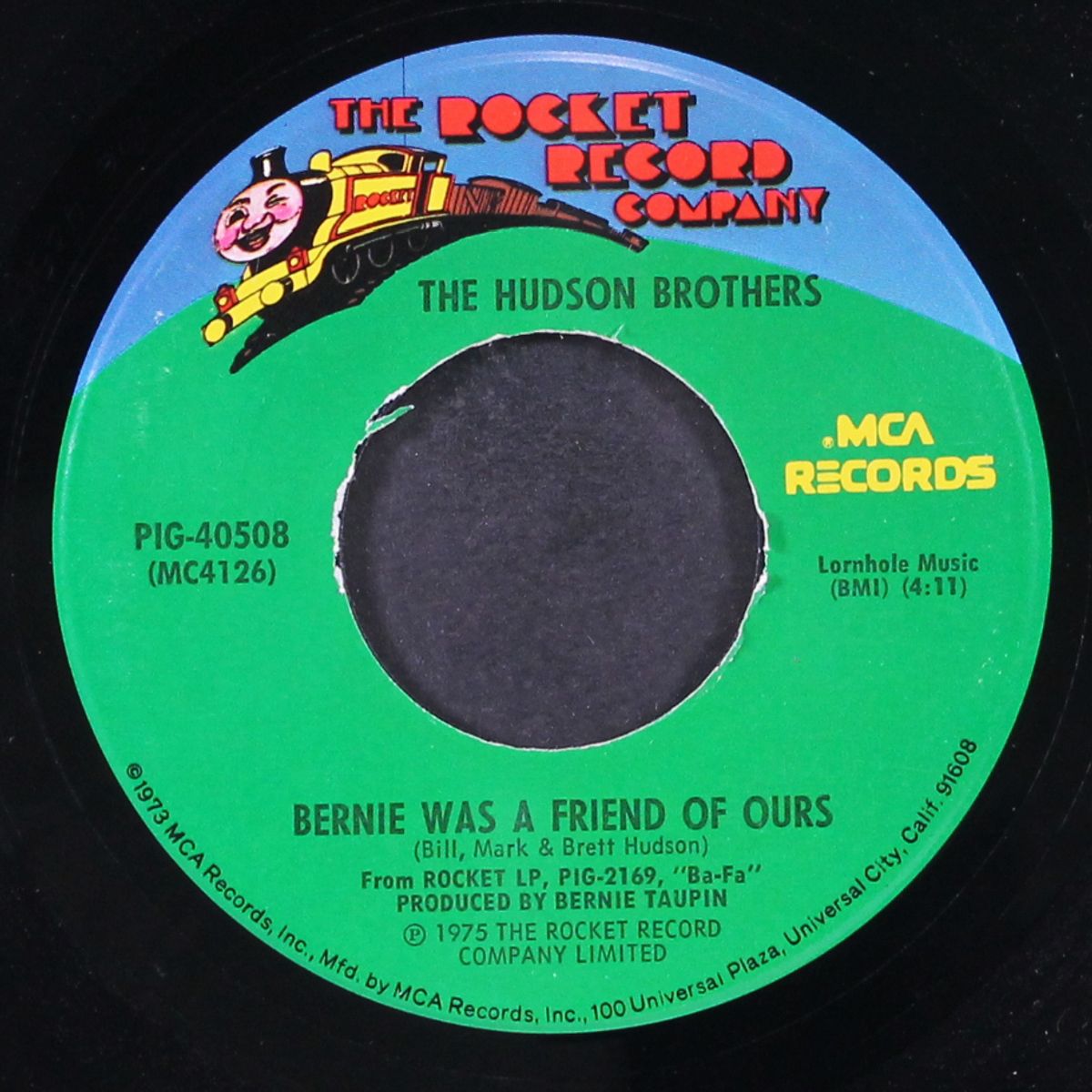 spinning the wheel / bernie was a friend of ours by HUDSON BROTHERS