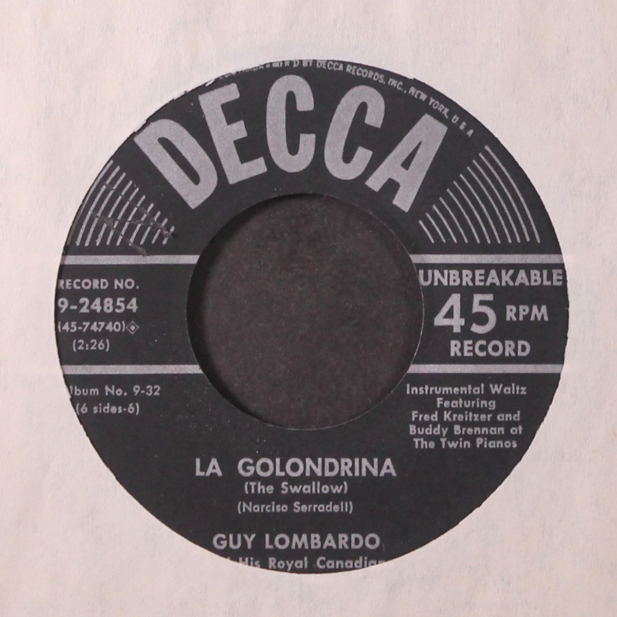 la golondrina / raindrop serenade by GUY LOMBARDO
