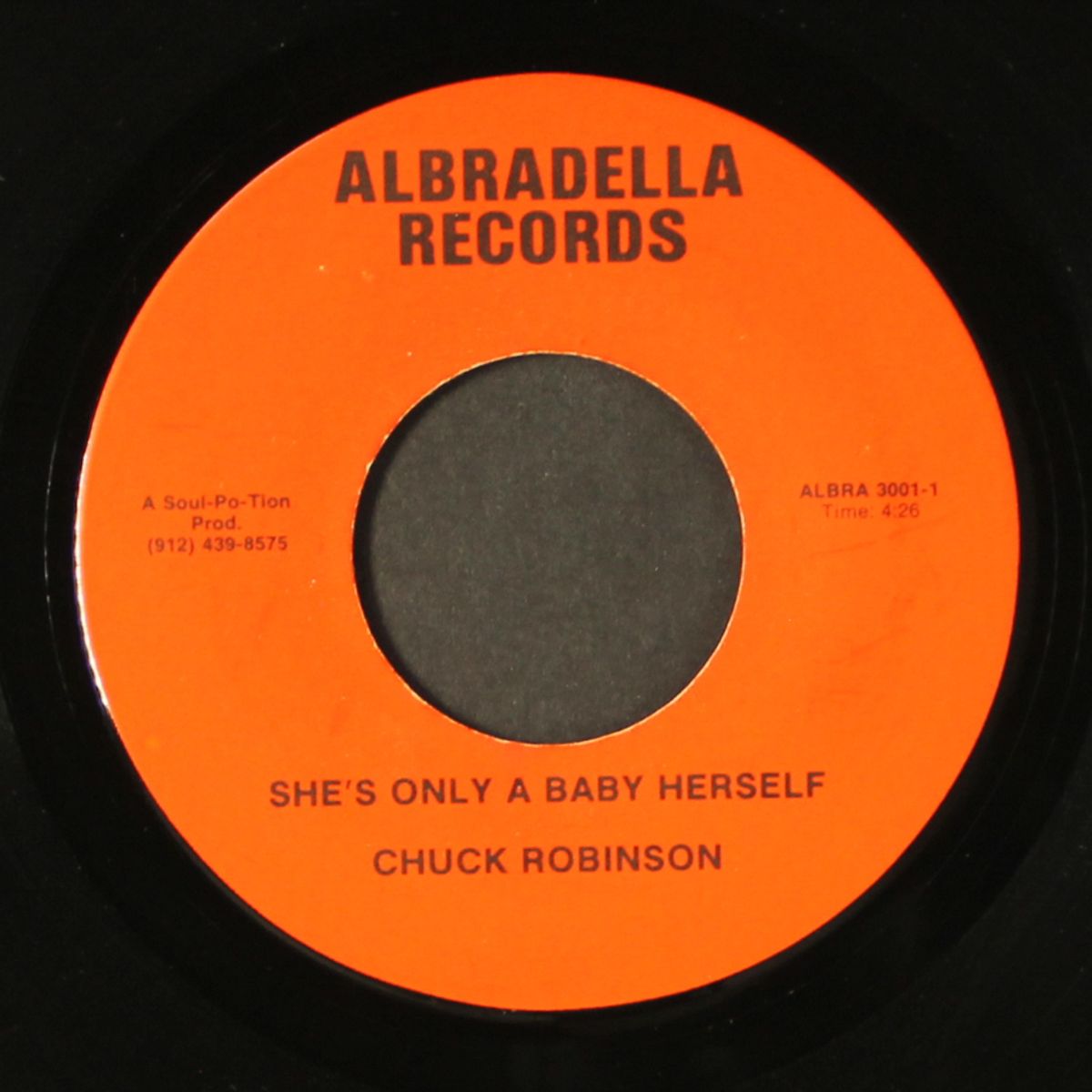 she's only a baby herself by CHUCK ROBINSON