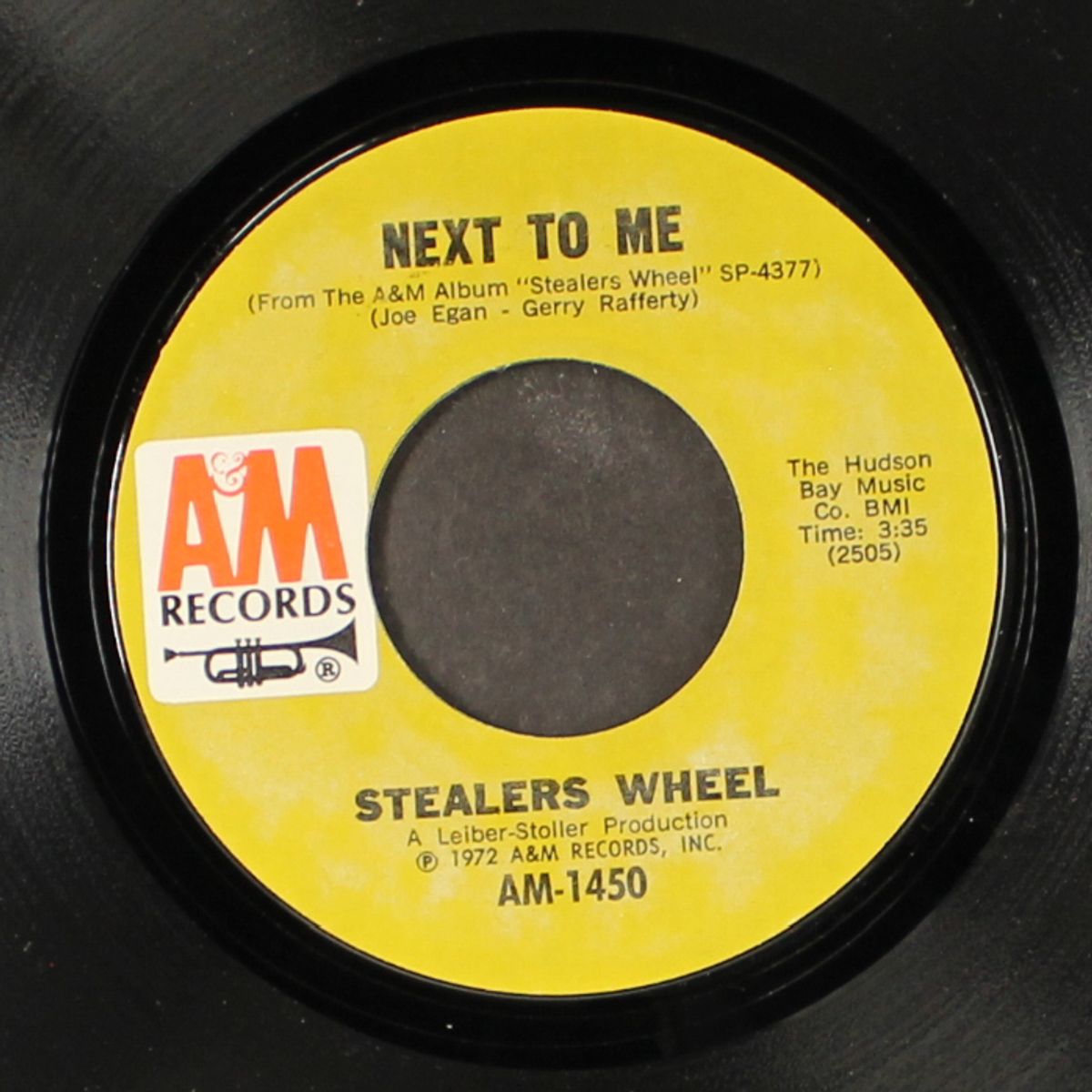 next to me by STEALERS WHEEL