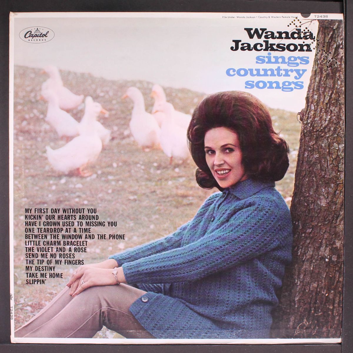 sings country songs by WANDA JACKSON
