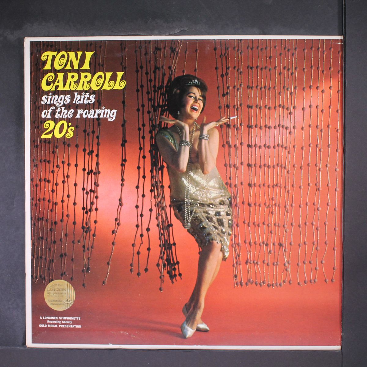 sings hits of the roaring 20's by TONI CARROLL