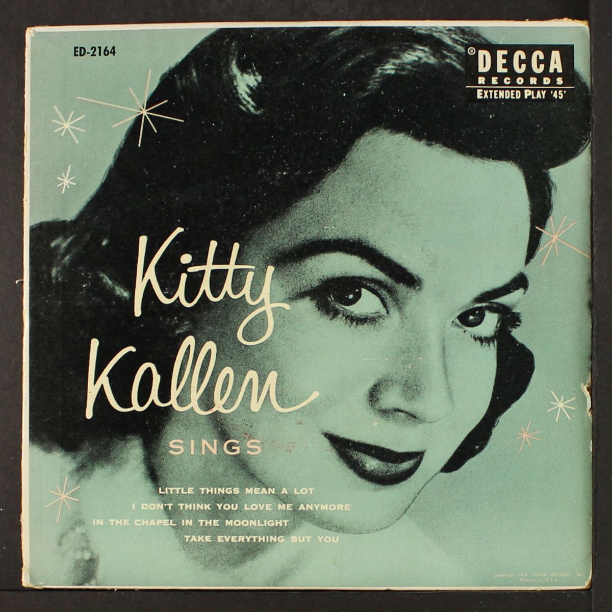 sings by KITTY KALLEN