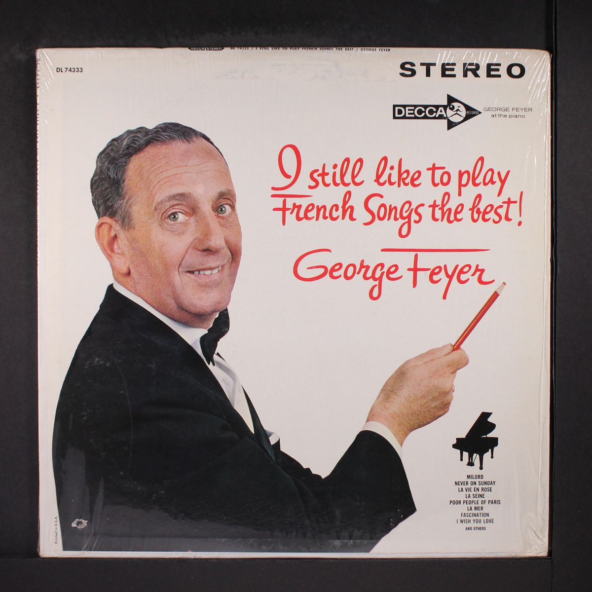 i still like to play french songs the best by GEORGE FEYER