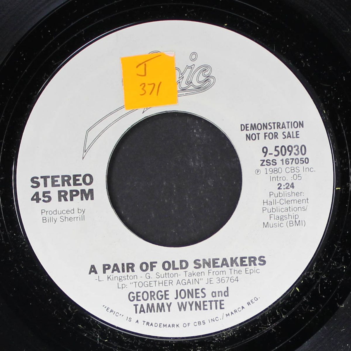 a pair of old sneakers / same by GEORGE JONES