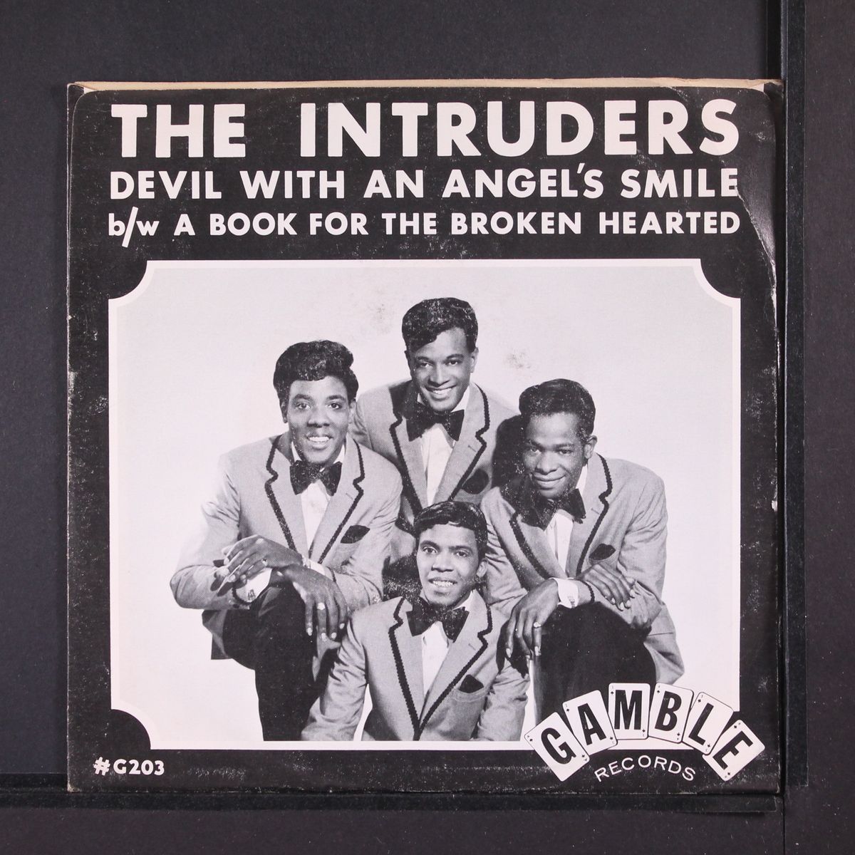 devil with an angel's smile / a book for the broken hearted by INTRUDERS