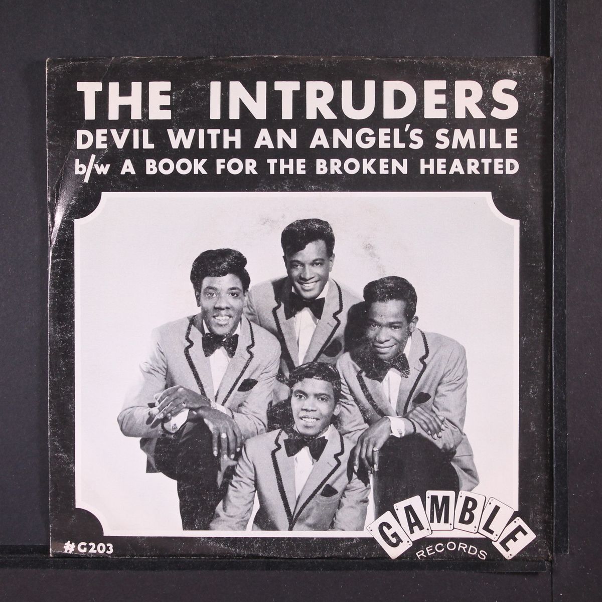 devil with an angel's smile / a book for the broken hearted by INTRUDERS