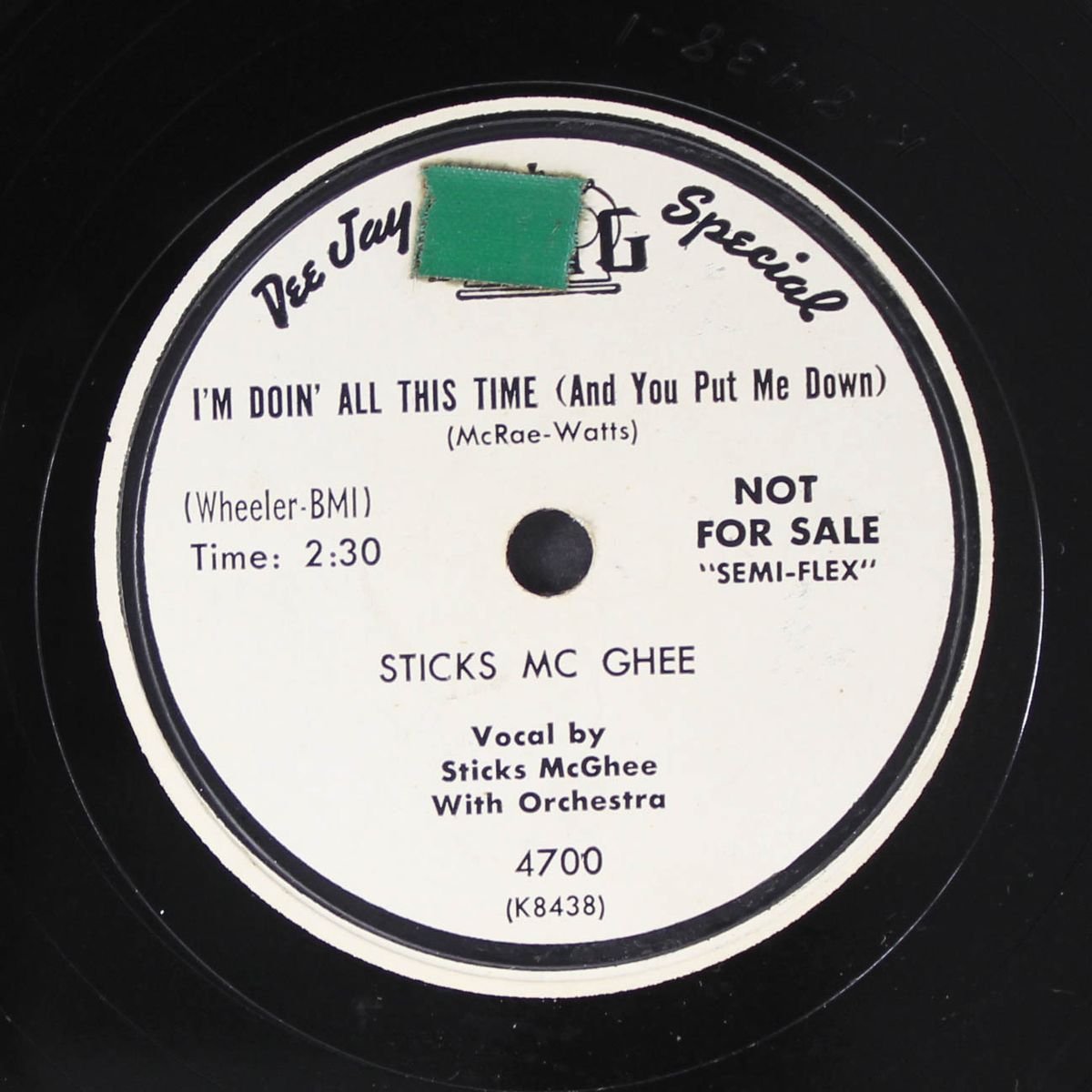 the wiggle waggle woo / i'm doin' all this time by STICKS MCGHEE