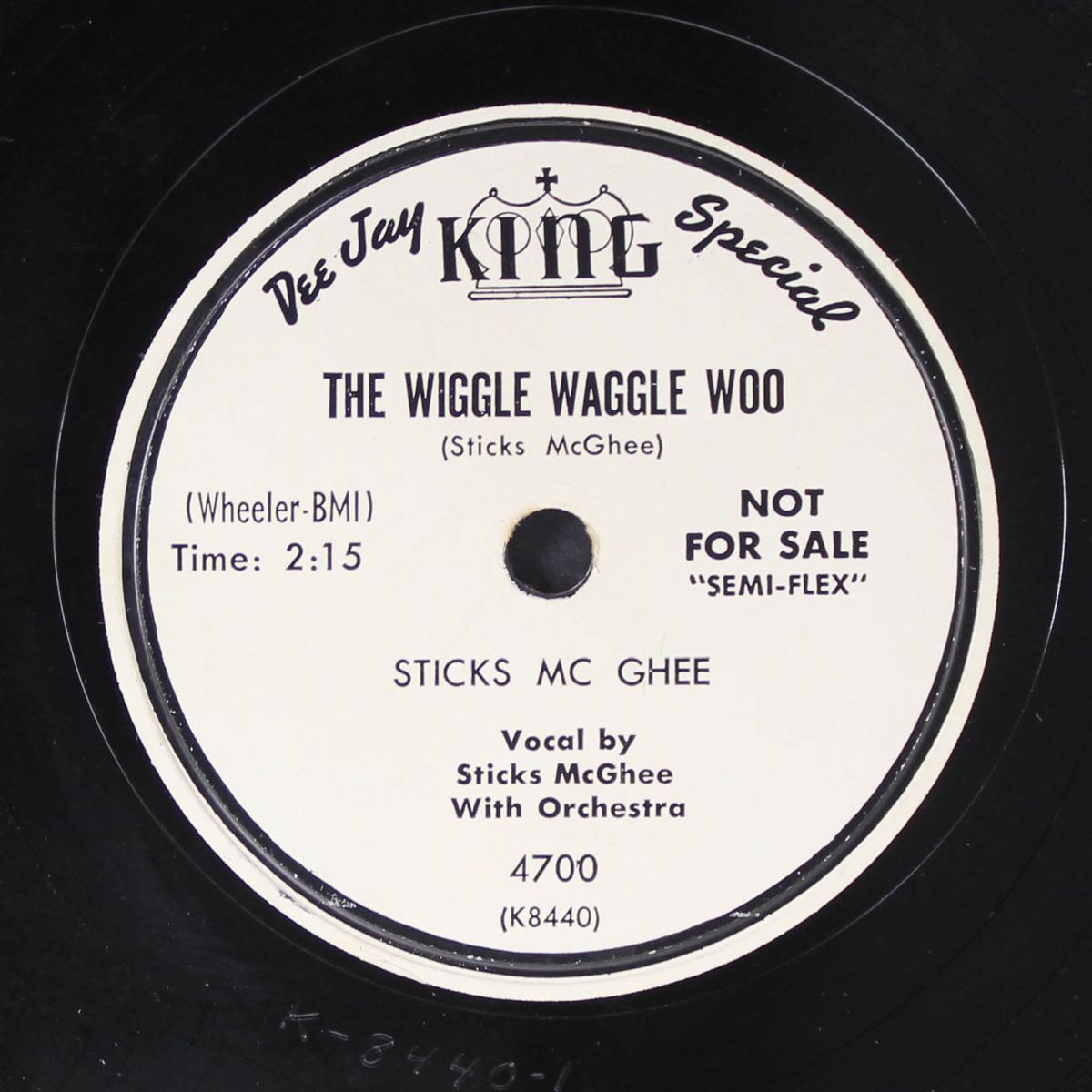 the wiggle waggle woo / i'm doin' all this time by STICKS MCGHEE