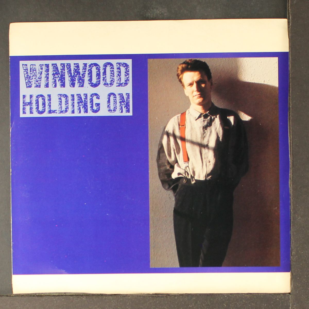 holding on by STEVE WINWOOD