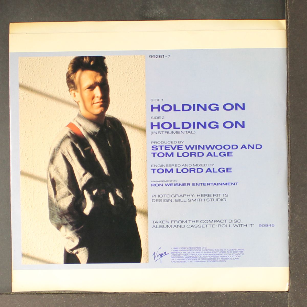 holding on by STEVE WINWOOD