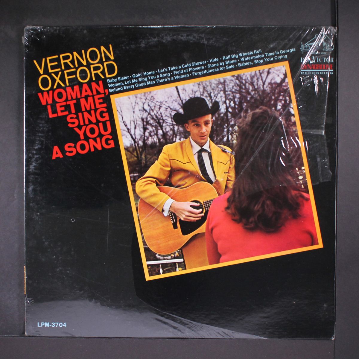 woman, let me sing you a song by VERNON OXFORD