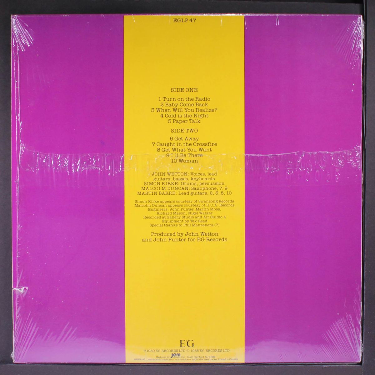 caught in the crossfire by JOHN WETTON