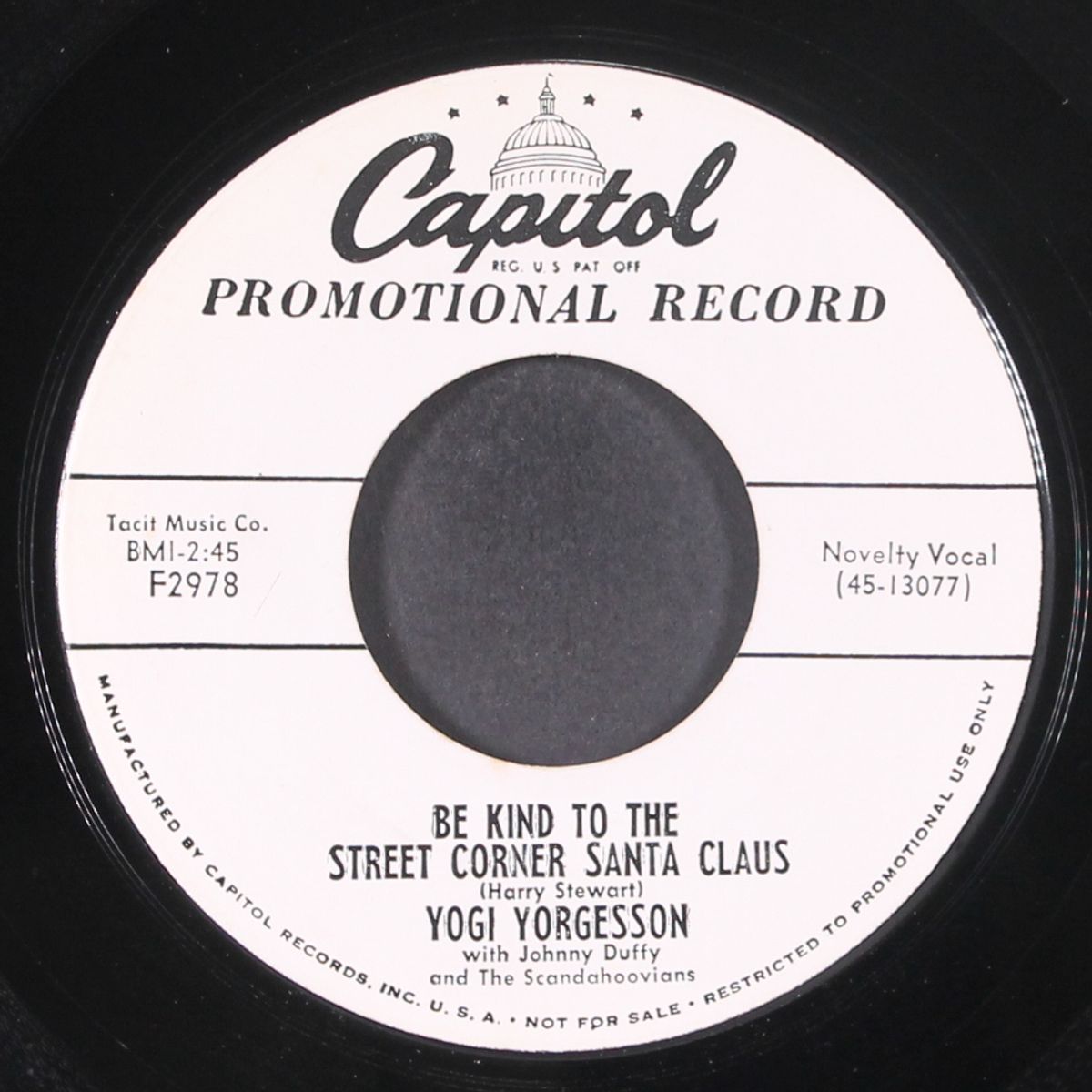 i give up what is it / be kind to the street corner santa claus by YOGI YORGESSON