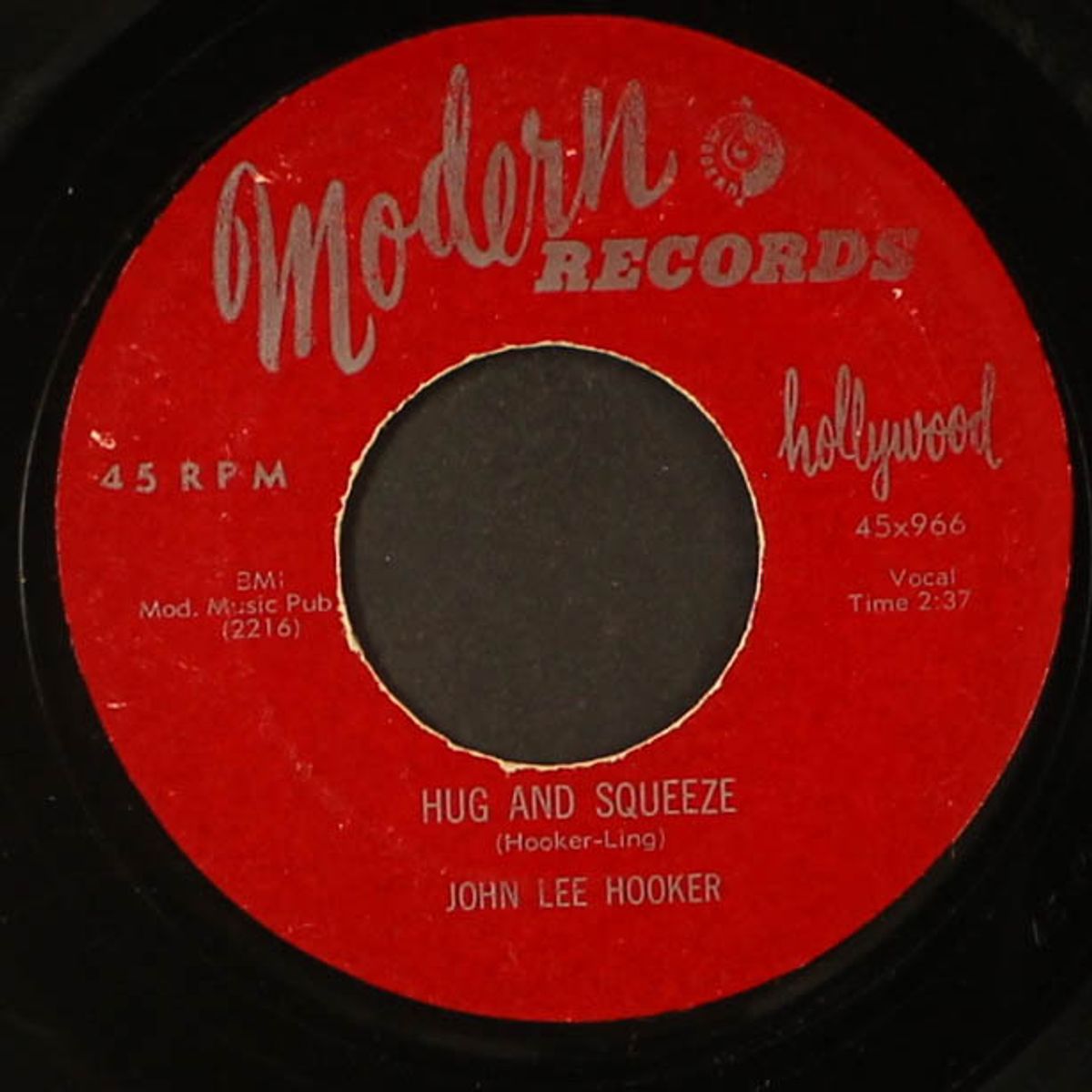 the syndicator / hug and squeeze by JOHN LEE HOOKER