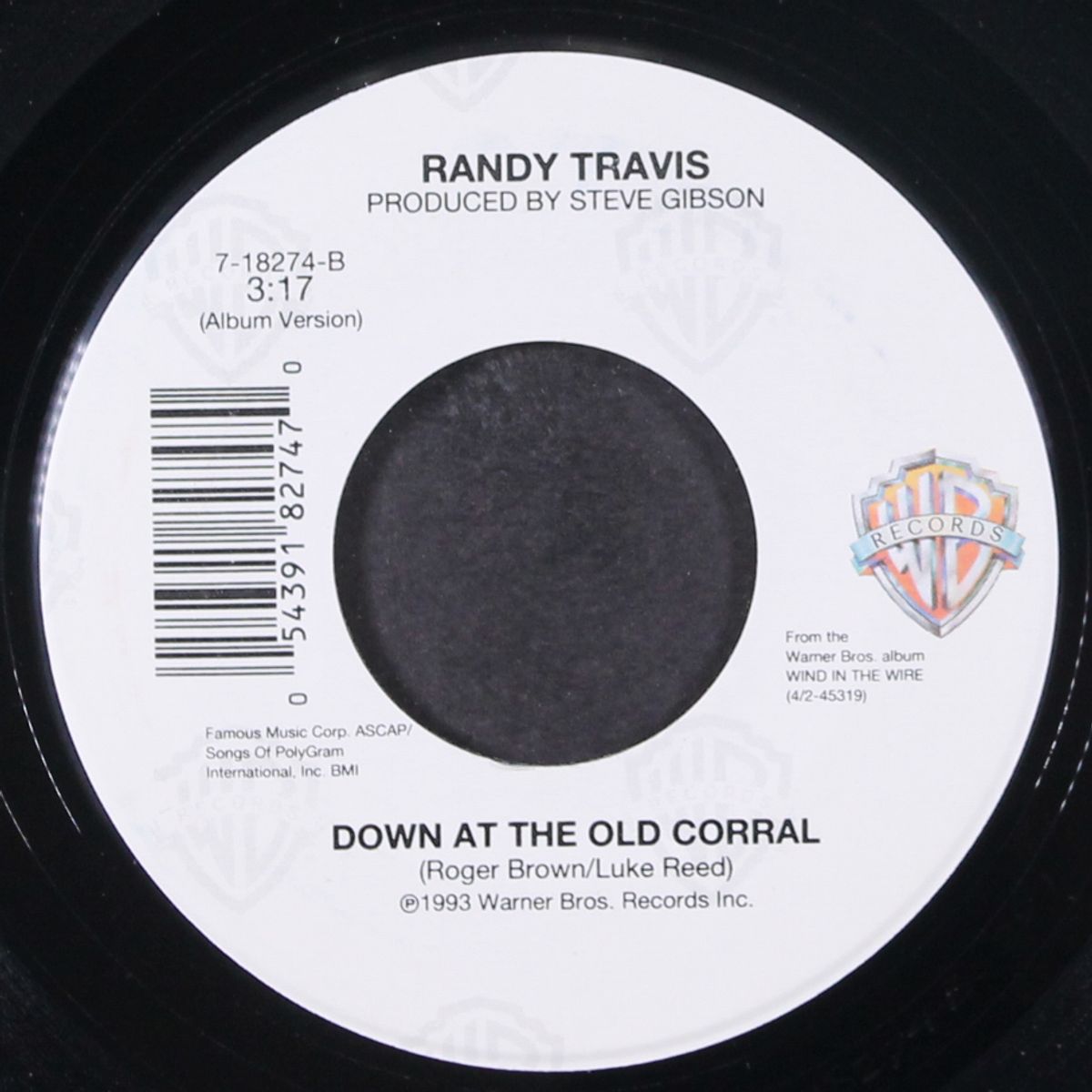wind in the wire / down at the old corral by RANDY TRAVIS