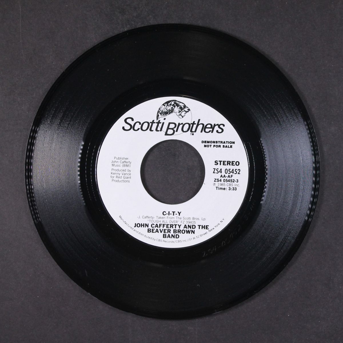 c-i-t-y by JOHN CAFFERTY