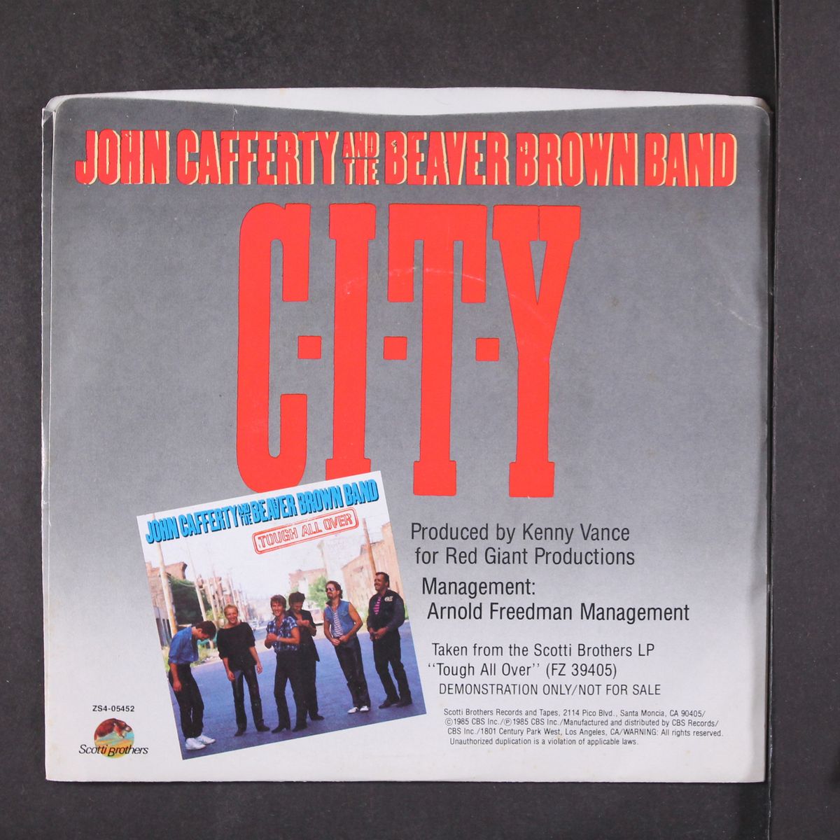 c-i-t-y by JOHN CAFFERTY