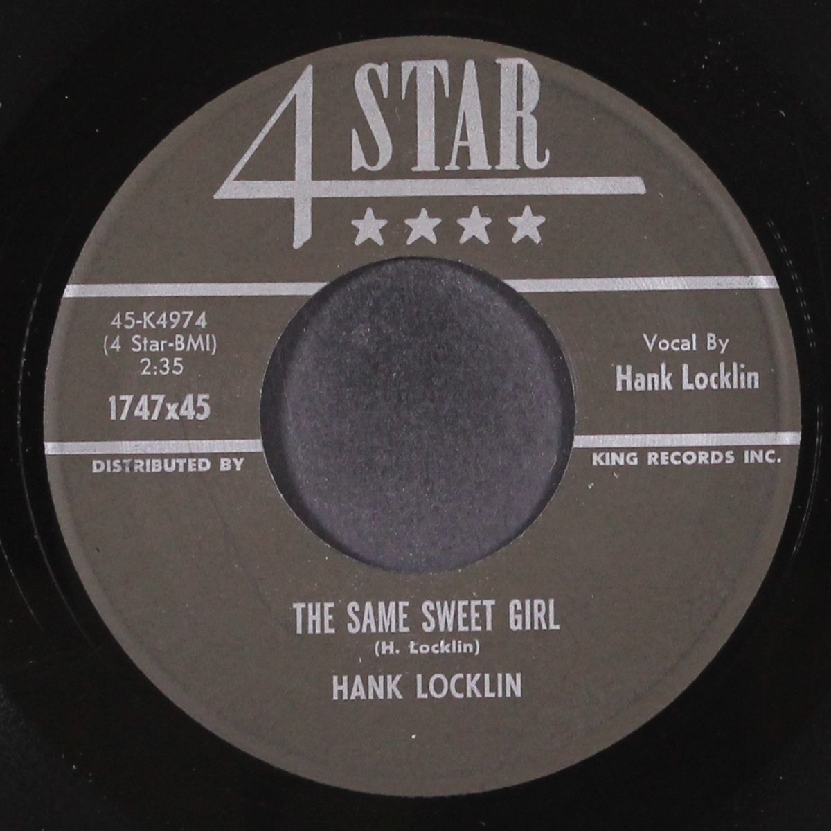 you burned a hole in my heart by HANK LOCKLIN