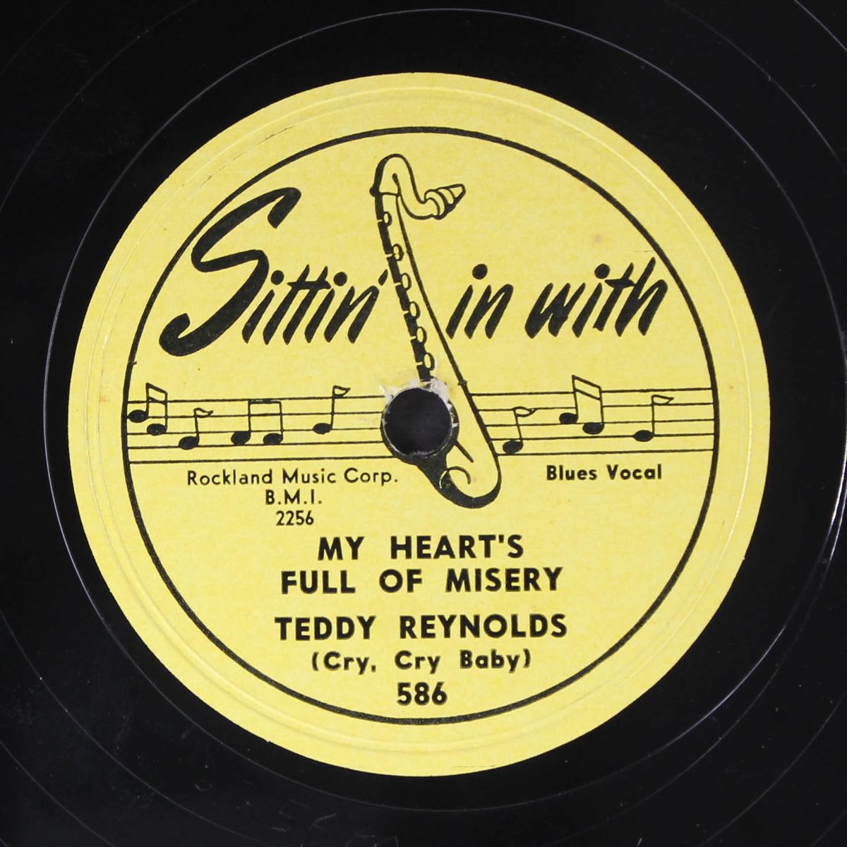 you put a voodoo spell on me / my heart's full of misery by TEDDY REYNOLDS