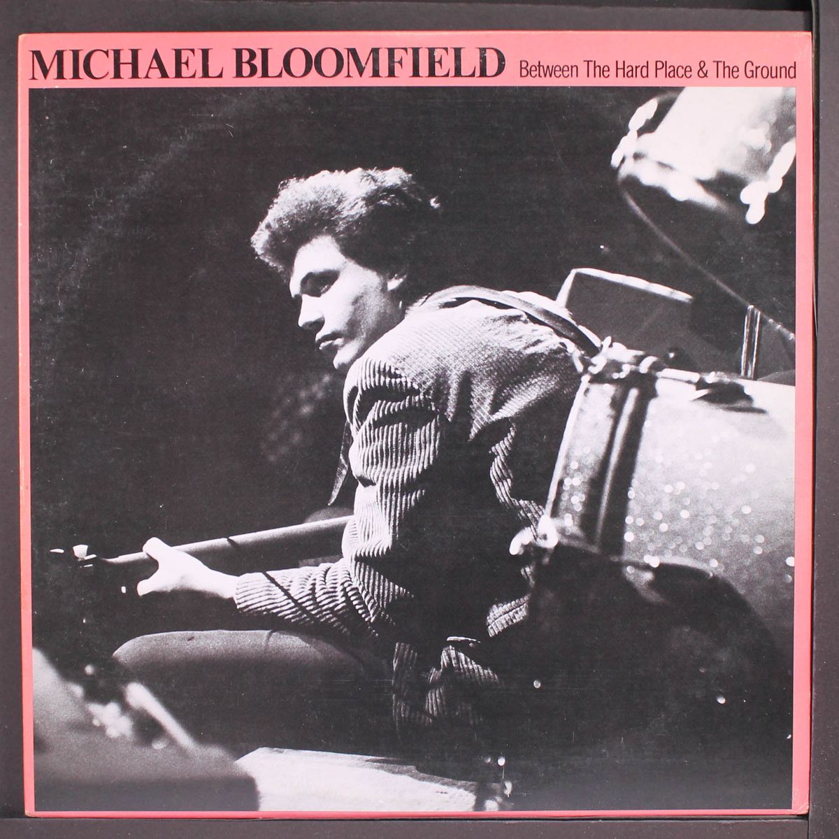 between the hard place and the ground by MICHAEL BLOOMFIELD