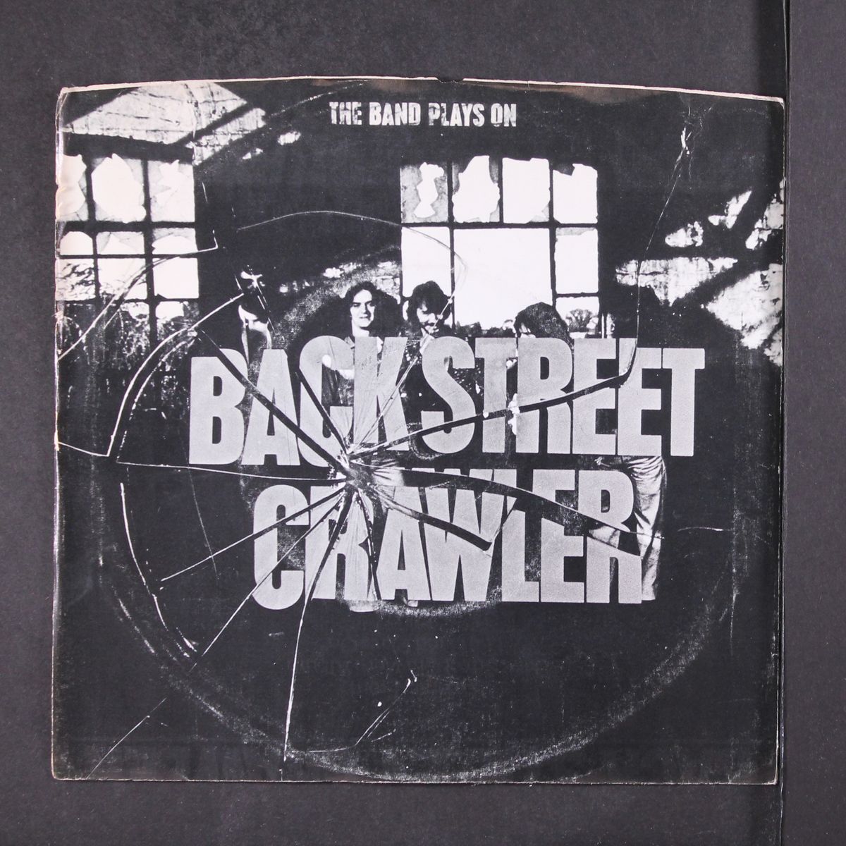the band plays on sampler e.p. by BACK STREET CRAWLER