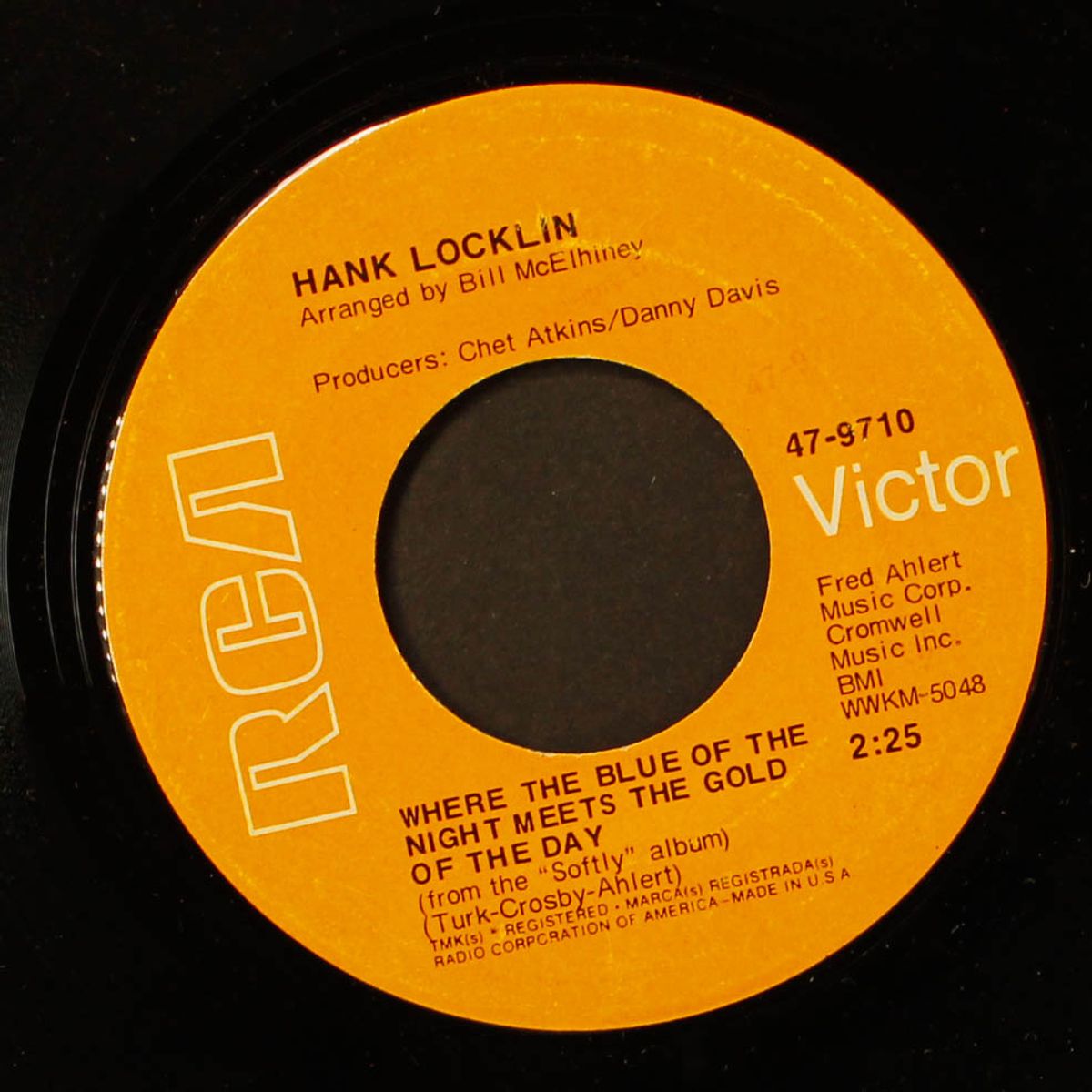 where the blue of the night meets the gold of the day by HANK LOCKLIN