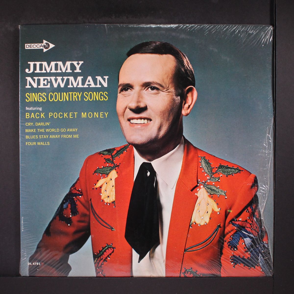 sings country songs by JIMMY NEWMAN