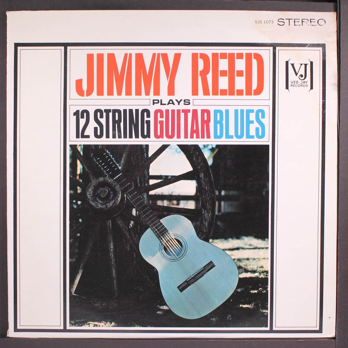 plays 12 string guitar blues by JIMMY REED