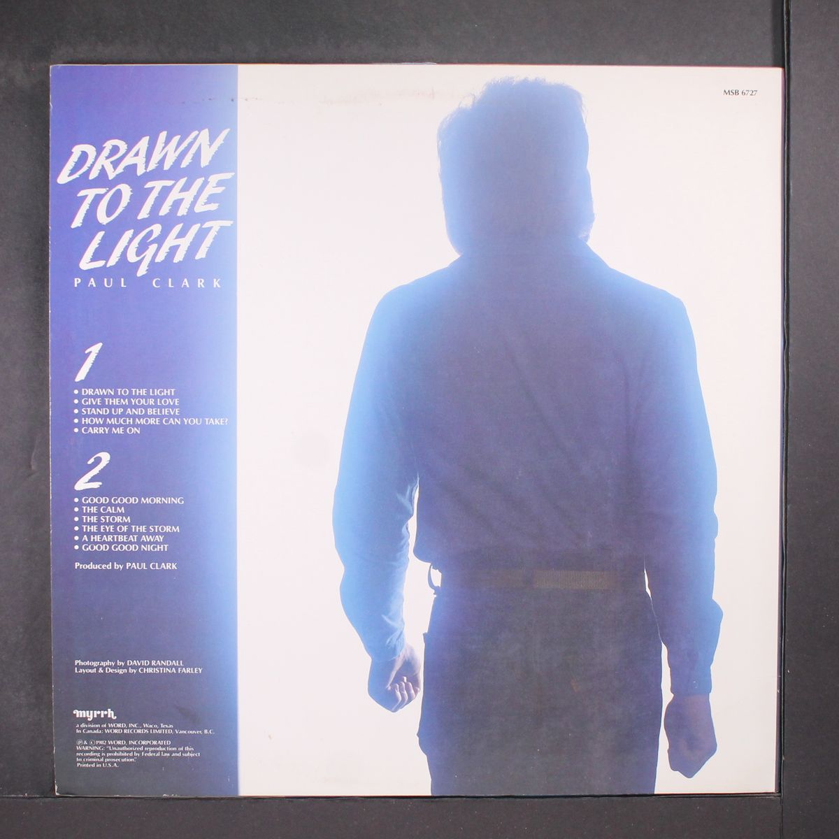 drawn to the light by PAUL CLARK