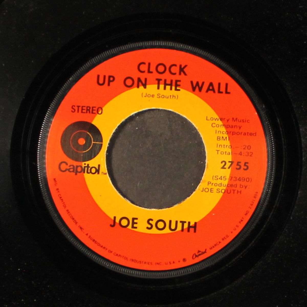 children / clock up on the wall by JOE SOUTH