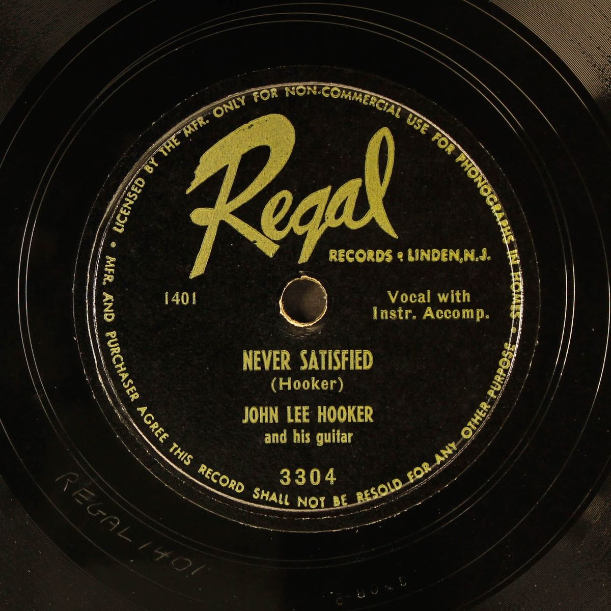 notoriety woman / never satisfied by JOHN LEE HOOKER