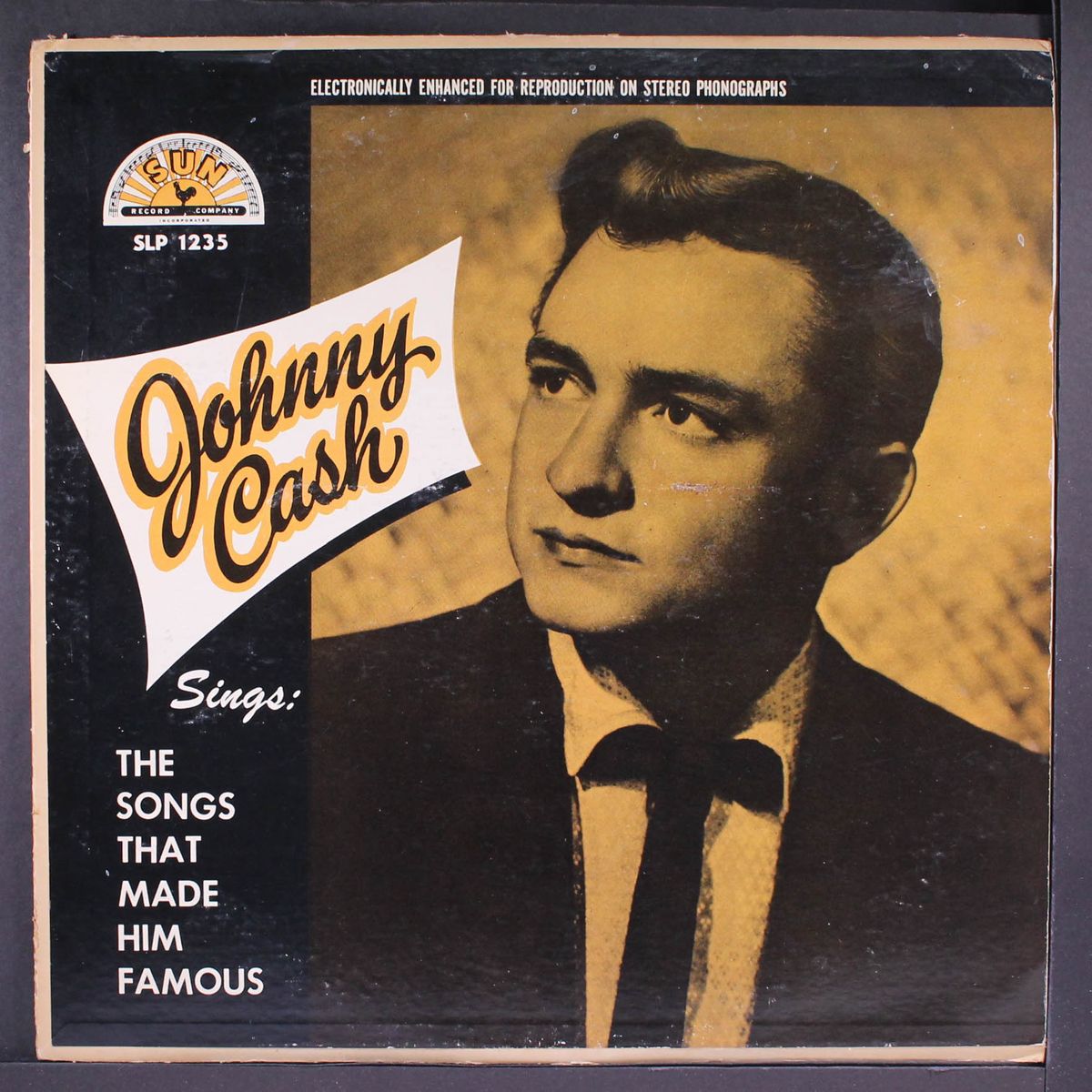 sings the songs that made him famous by JOHNNY CASH