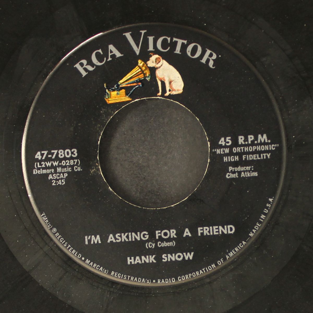 the man behind the gun by HANK SNOW