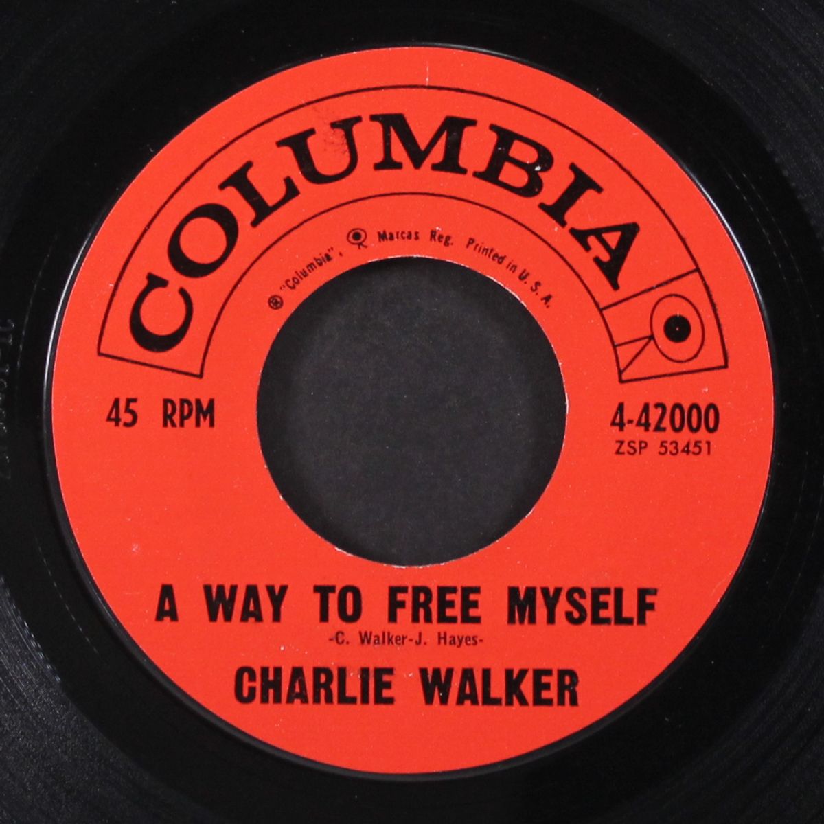a way to free myself / right at your back door by CHARLIE WALKER
