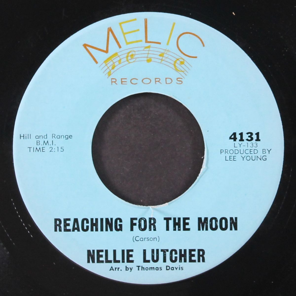 reaching for the moon / heart of a clown by NELLIE LUTCHER