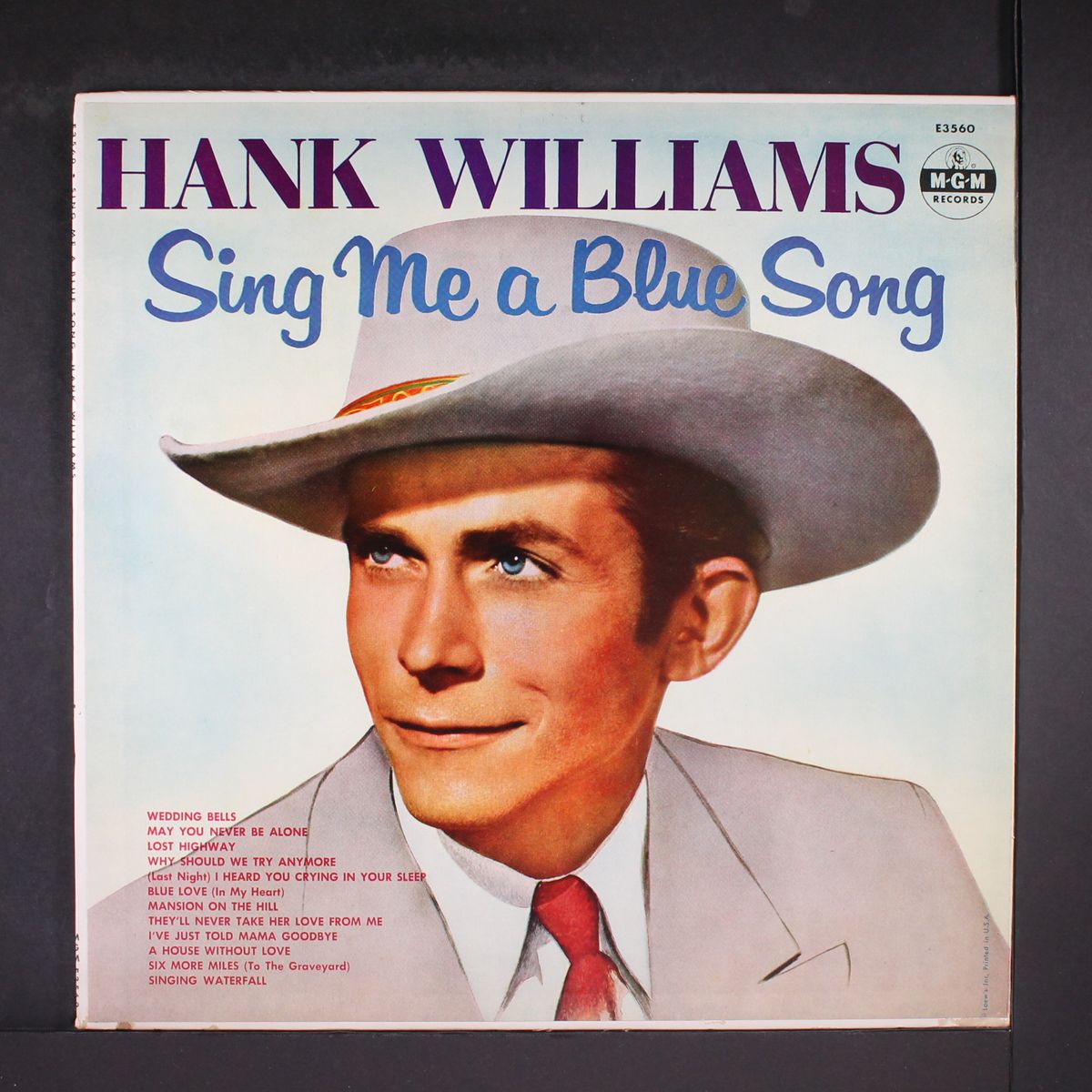 sing me a blue song by HANK WILLIAMS