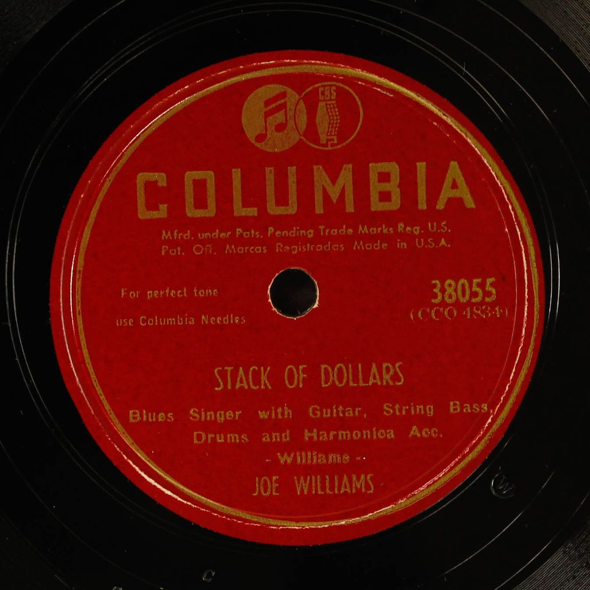stack of dollars / mellow apples by JOE WILLIAMS