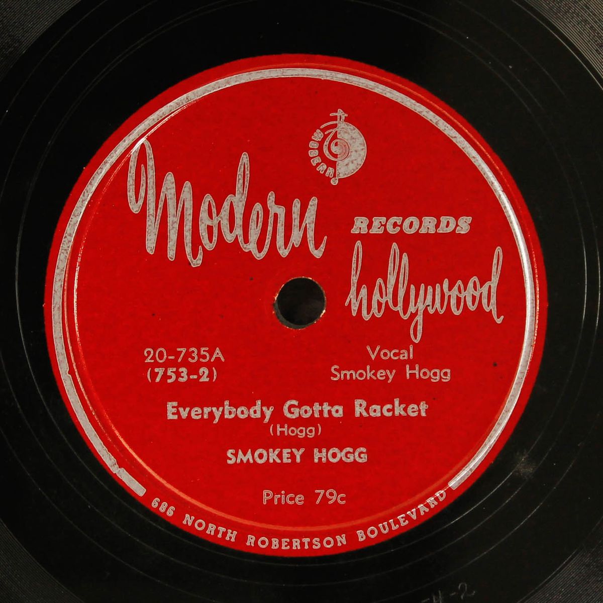 what more can a woman do / everybody gotta racket by SMOKEY HOGG