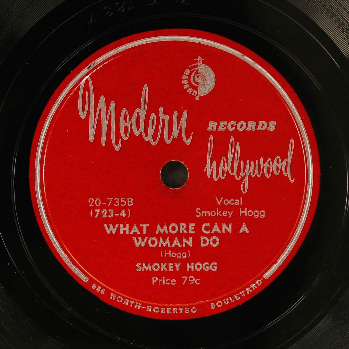 what more can a woman do / everybody gotta racket by SMOKEY HOGG