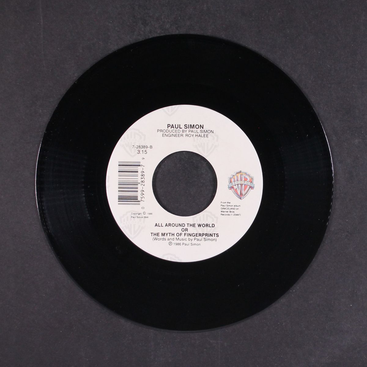 diamonds on the soles of her shoes / all around the world or the myth by PAUL SIMON